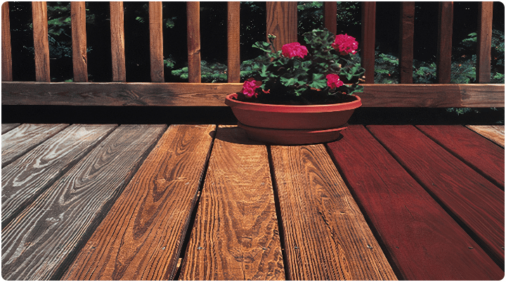 before and after image of dirty deck that has been stained and sealed